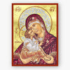Icon of Mother of God holding Christ against a gold background
