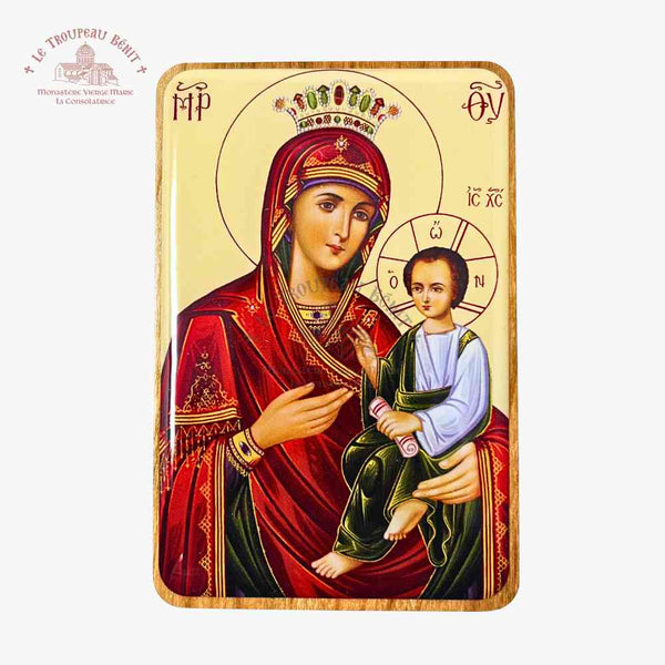 Icon of a religious figure holding a child on a gold background with 'Troupeau Benit' logo branding in the top left corner