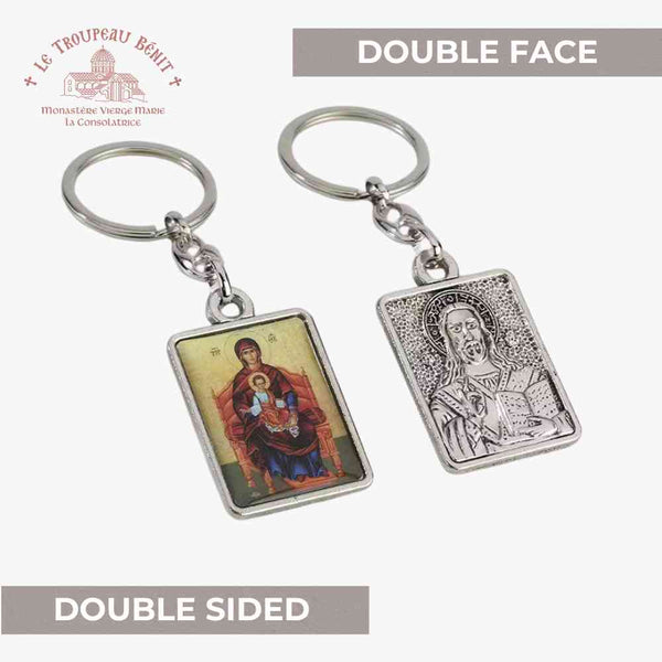 Double sided keychain with the Mother of God enthroned and Christ with visible 'Troupeau Benit' logo branding