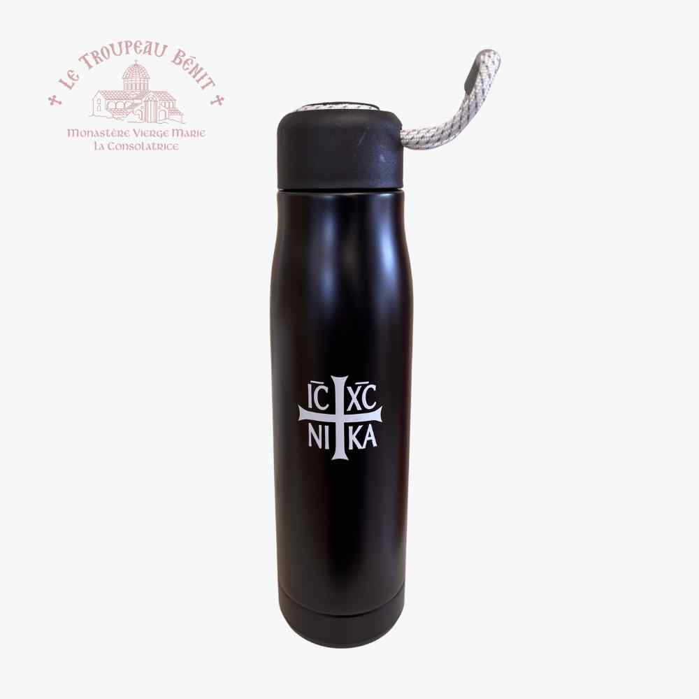 Black tall water bottle with IC XC NIKA emblem in white and Le Troupeau Benit logo in top left corner
