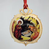 Nativity of Christ byzantine icon in a wooden ball Christmas ornament sold by the sisters of monasterevmc.org / Ornement de Noël, boule décorative en bois avec icône byzantine de la Nativité du Christ, vendue par les soeurs du monasterevmc.org