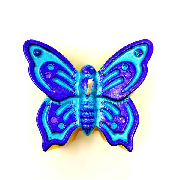 "Butterfly" beeswax candle handmade in Canada and sold by the sisters of monasterevmc.org / Chandelle en cire d'abeille "Le papillon" faite à la main par les soeurs du monasterevmc.org
