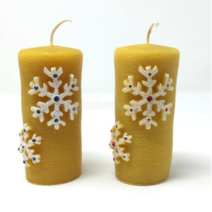 All Natural Beeswax Pillar "Christmas snowflakes" candles made by the sisters of monasterevmc.org using 100% Canadian local beeswax / Bougies "Flocons de Noël" en cire d'abeille fabriquées par les soeurs du monasterevmc.org